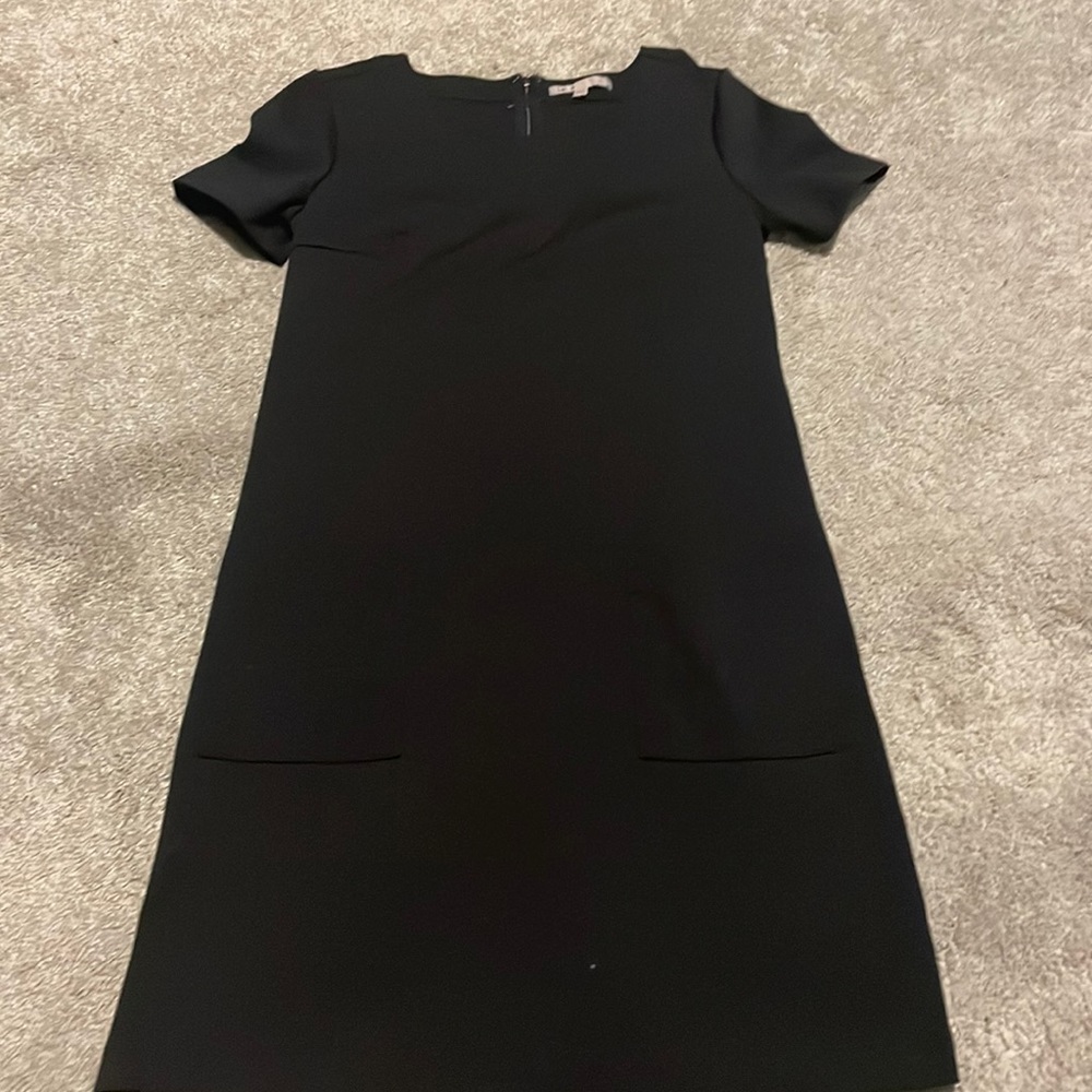 Black xs gas shift dress that is too small!